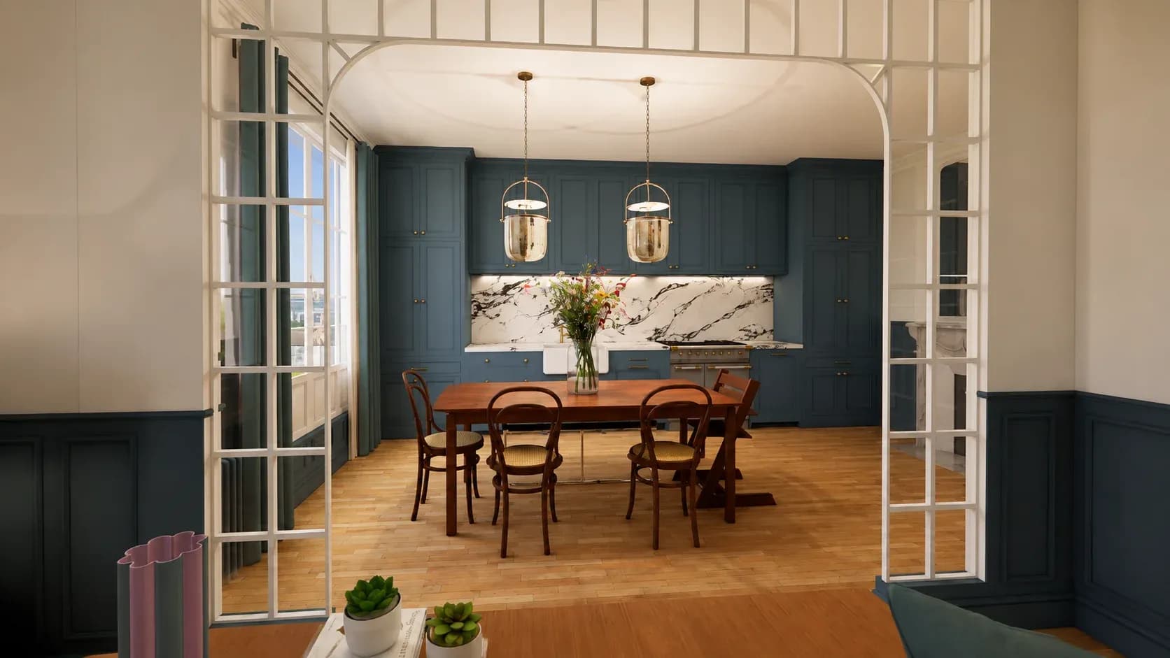 Cuisine bleue sous verrière avec suspensions et table en bois